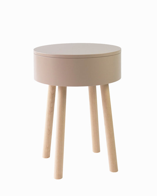 Multifunctional Piilo stool in color of Chocolate Milk. Piilo is a stool with storage space hidden inside its seat. Designed by Hanna Lantto. Made in Finland.