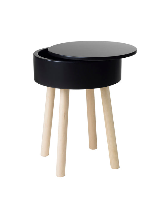 Multifunctional Piilo stool in black. Piilo is a stool with storage space hidden inside its seat. Designed by Hanna Lantto. Made in Finland.