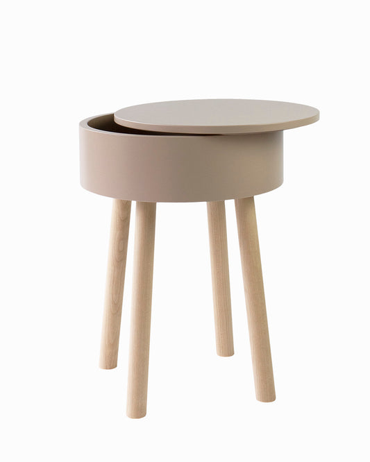 Multifunctional Piilo stool in color of Chocolate Milk. Piilo is a stool with storage space hidden inside its seat. Designed by Hanna Lantto. Made in Finland.